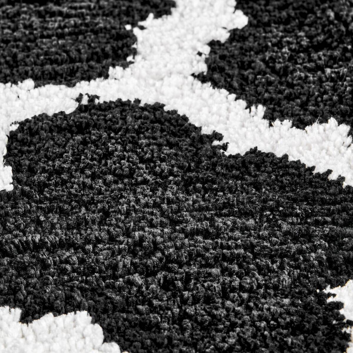 Badematte schwarz Vorderseite: 100% Polyester Rückseite: 100% Latex B/L: ca. 60x100 cm